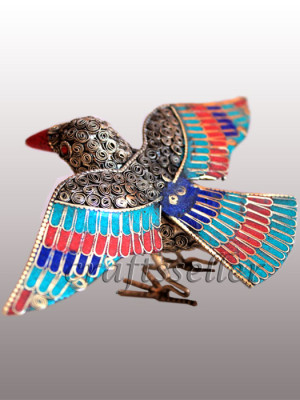 Filigree flying bird stone setting