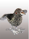 Filigree sitting bird