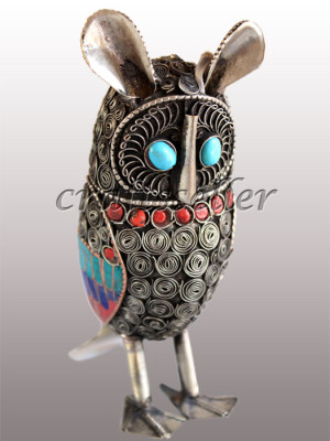 Filigree owl stone setting
