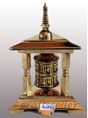 Table prayer wheel with triangular base